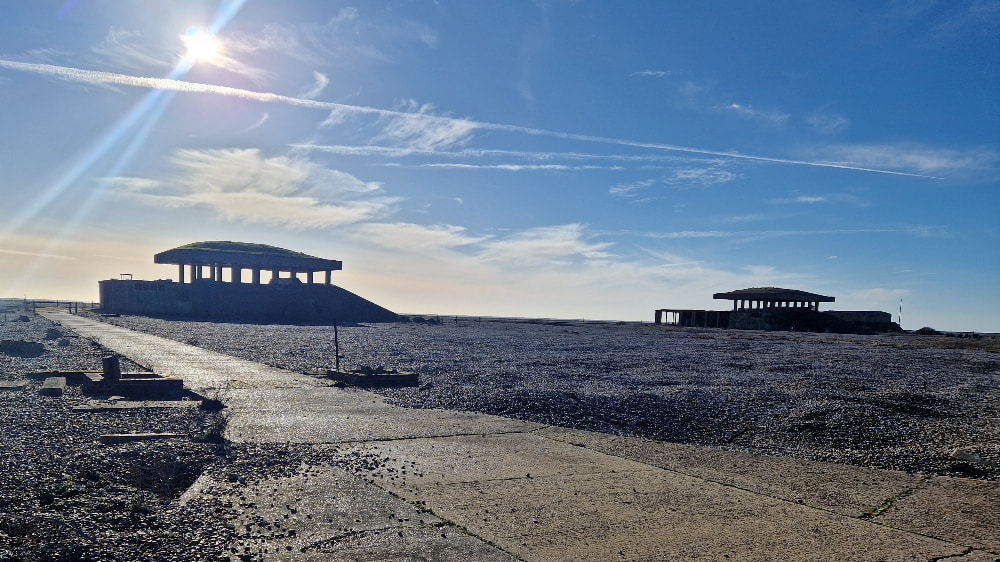 View of two of the concrete pagoda-style buildings at Orford Ness